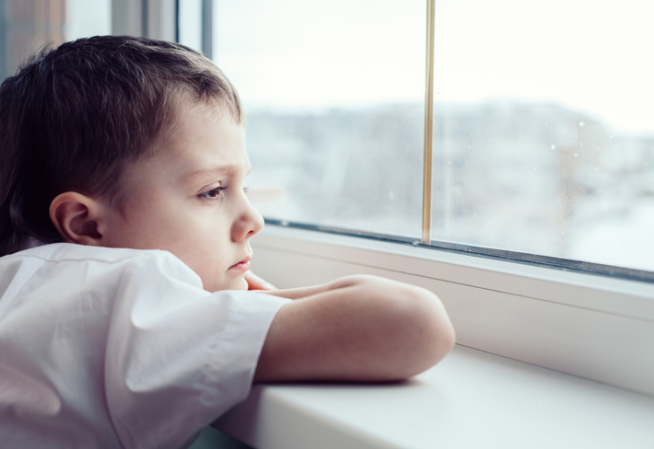 Child looking out the window