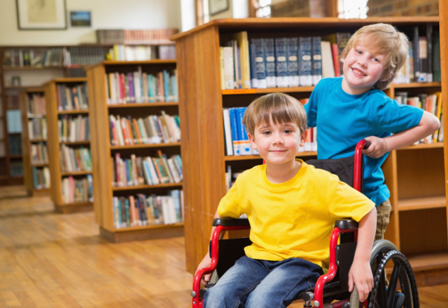 2 children in a library